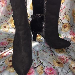 Bellini chained pointed toe bootie.